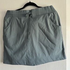 Teal shorts by Pacific Trail for women.